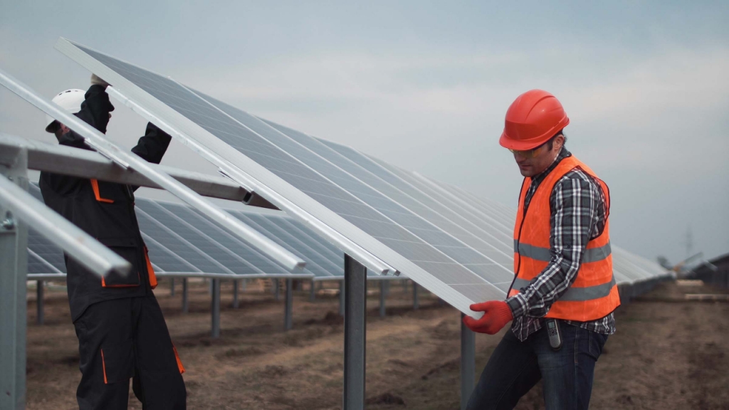 man puts a panel solar